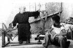 Dominic: My nonna Duma (Dinka) on the spinning wheel and my brother Matthew looking on (1952).